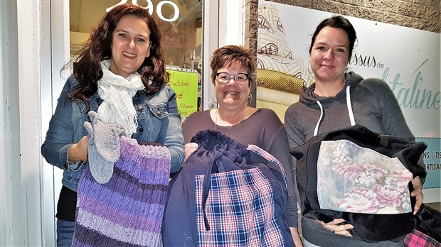Le Cercle de fermières de Ste-Marie permet à des enfants d'être tenus au chaud