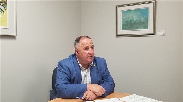 Le député Paul Busque présente fièrement son bilan