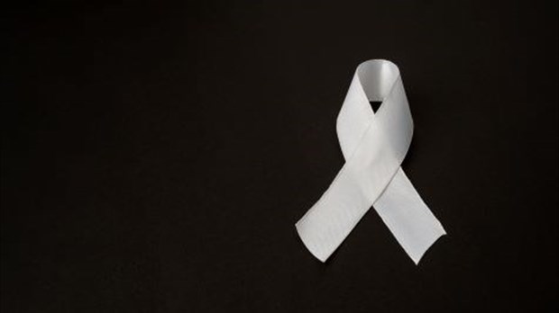 Une invitation à porter le ruban blanc