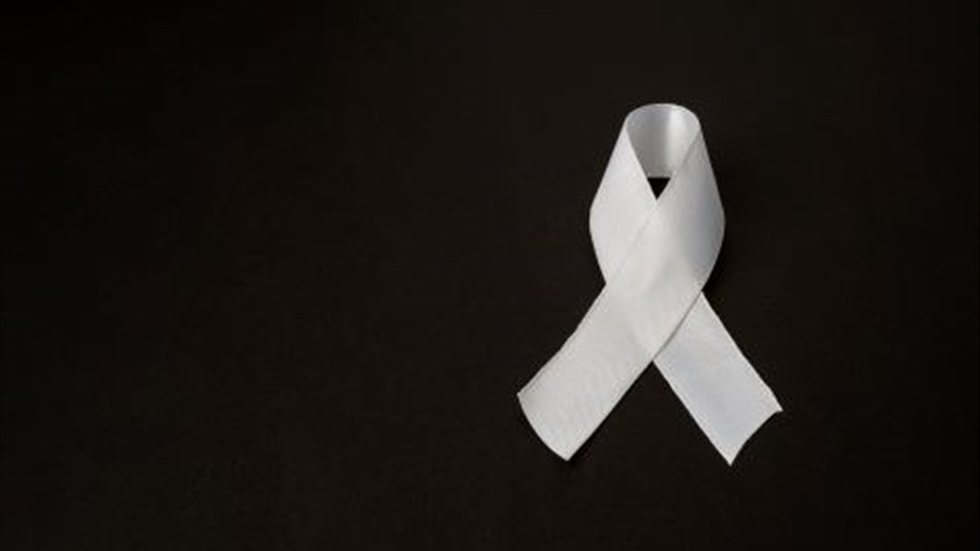 Une invitation à porter le ruban blanc